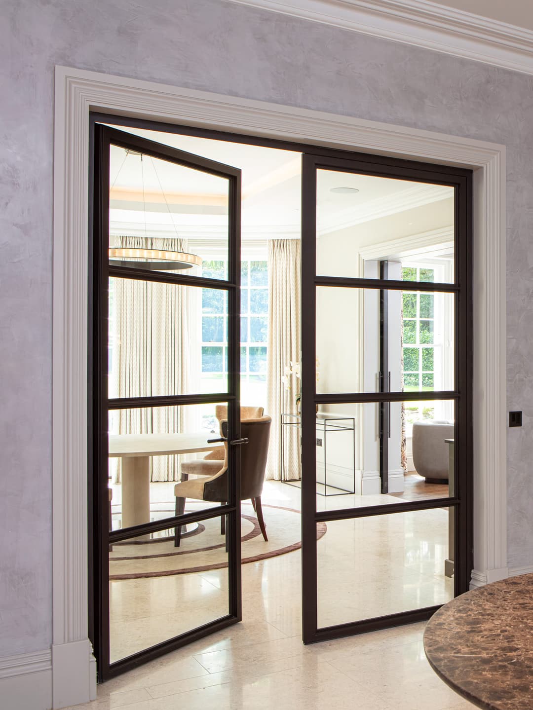 fire rated steel glazed double doors in a high end residential setting